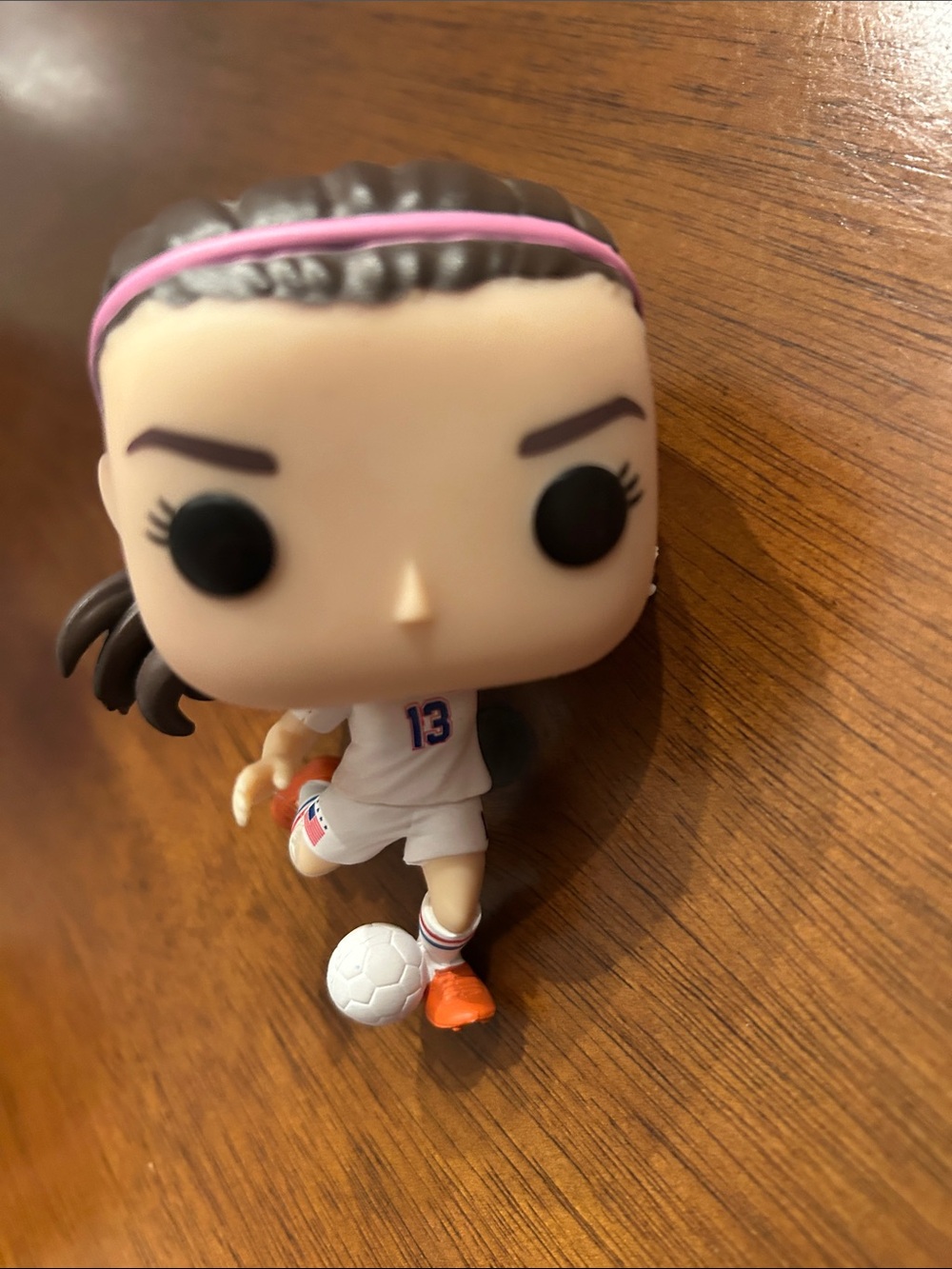 Funko Vinyl Soccer Player Figure with Pink Headband and Orange Shoes